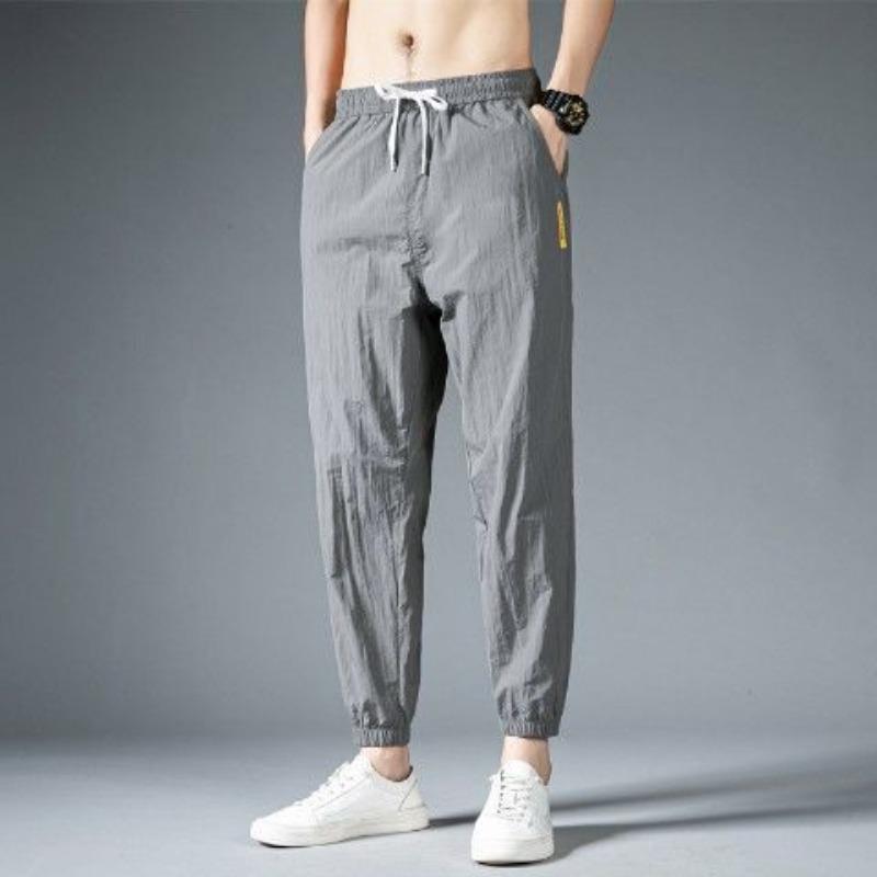 Men's sports casual pants summer trendy brand ice silk thin loose large size nine points tied feet trendy trousers