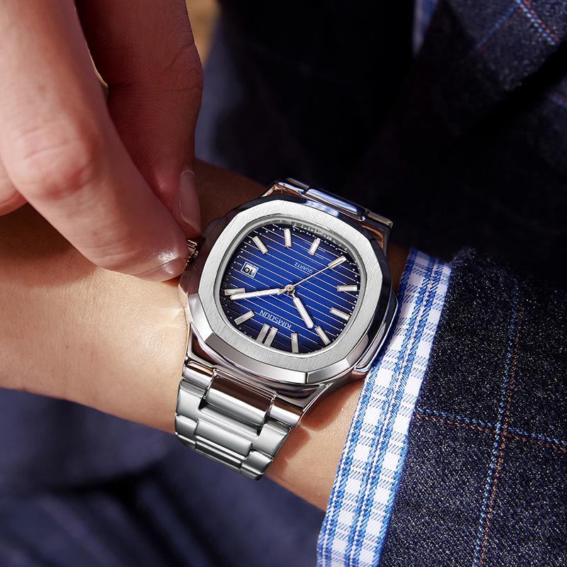 Jin Shidun Men's Luminous Quartz Skeleton Watch with Steel Band and Date Display.