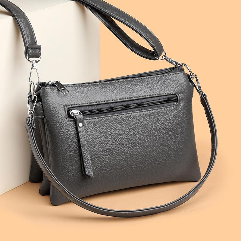 Fashionable and Fashionable Texture Middle-aged Woman Holding A Small Bag In Her Hand  Simple and Versatile One-shoulder Crossbody Bag