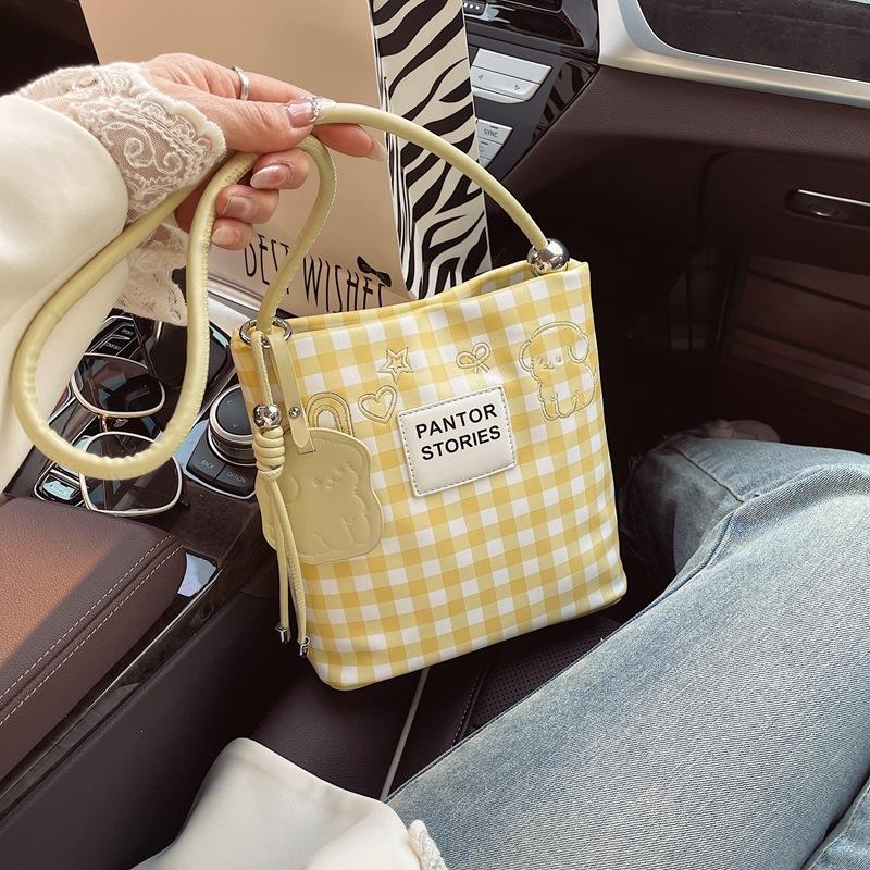 

Canvas plaid bag cartoon puppy shoulder bag women s summer outing bag 2025 new casual oblique span handbag 21*10*12 жовтий