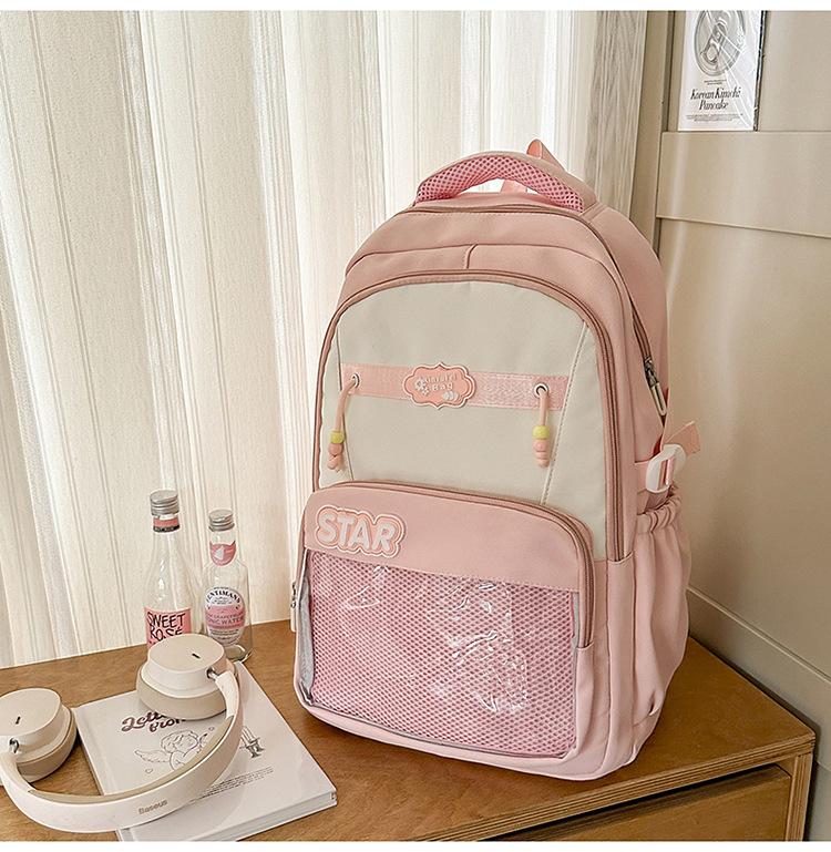 Small fresh contrasting color schoolbag niche design casual versatile children's backpack high value light burden reduction shoulder