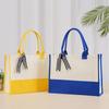 Large-Capacity Fashion Tote: Film-Coated Spliced Canvas Handbag