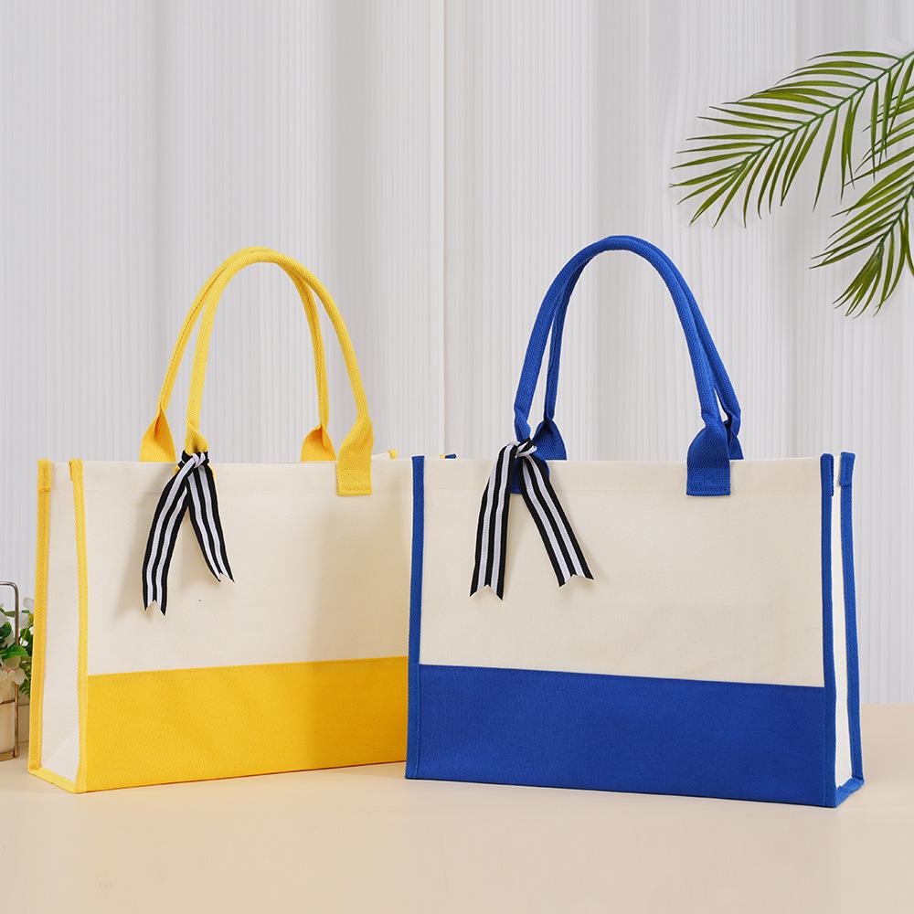 Large-Capacity Fashion Tote: Film-Coated Spliced Canvas Handbag