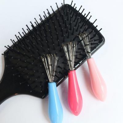 Grzebień do czyszczenia szczotki do włosów Plastikowa rączka do usuwania szczotki do czyszczenia Wbudowane narzędzia kosmetyczne Produkty czyszczące Środki czyszczące