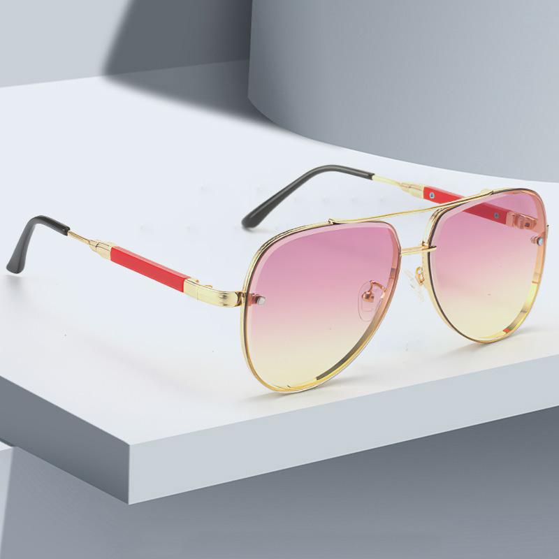 Latest in Sunglasses for Women Trendy Styley Gradient Lenses Golden Borders Red Temple Glass Minimalist Design Exudes Modernity