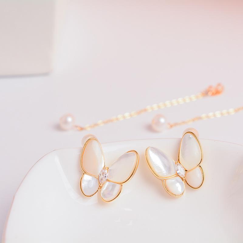 Korean version two wearing new natural freshwater pearl stud earrings women's S911 silver needle light luxury high-end butterfly earrings accessories