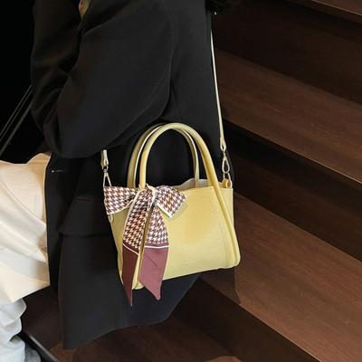 Neue Retro einfache Hand-Eimer-Tasche Damen Frühling und Sommer Trend Nische Schultertasche lässige Damen-Tasche