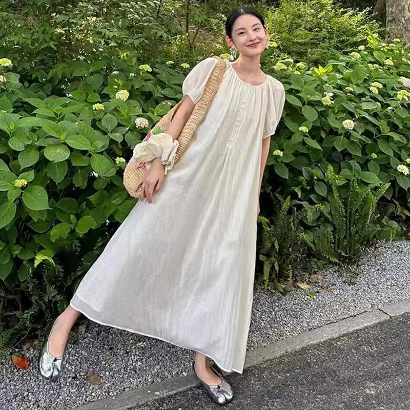 

Chic Korean-Style Loose Maternity Summer Dress with Button-Down Breastfeeding Access for a Slimming Temperament in French Style. XL абрикосовий