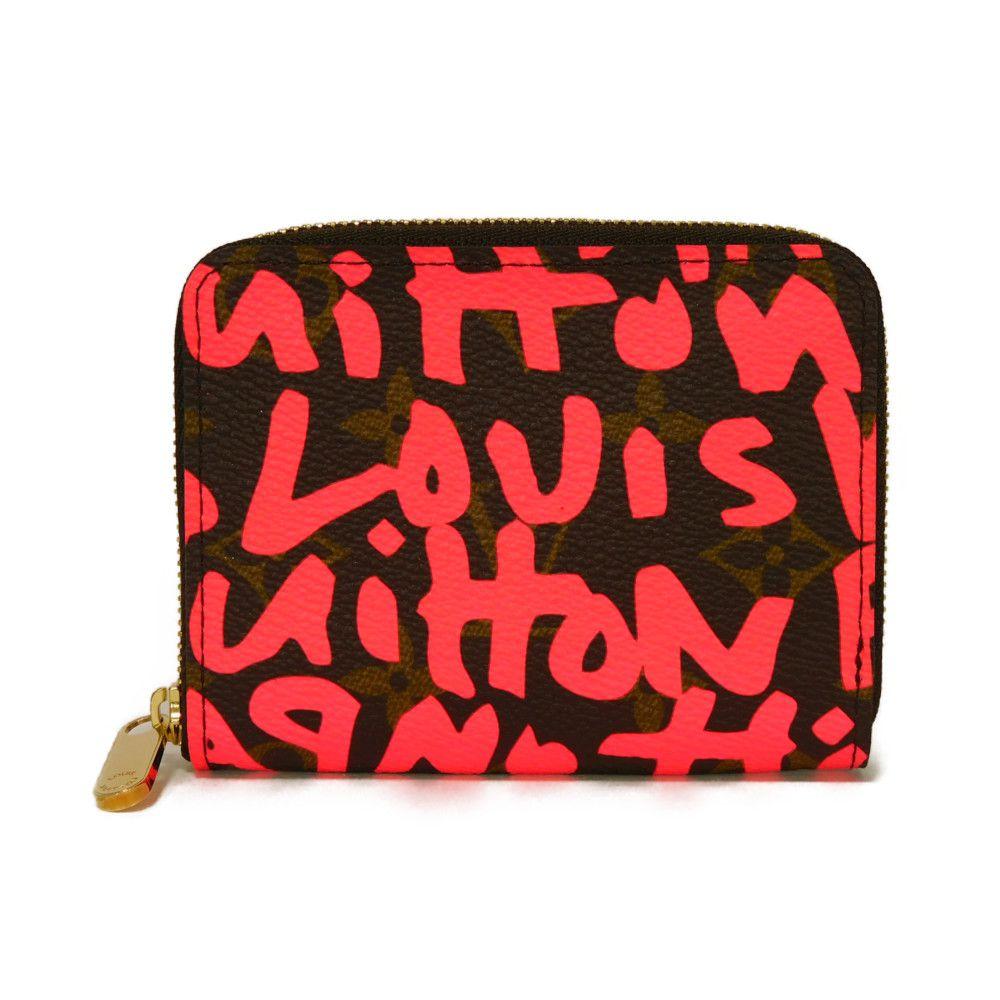 

Used 12564 zip-around purse M93707 7943 fluorescent pink zip-around purse in excellent condition. Monogram Graffiti