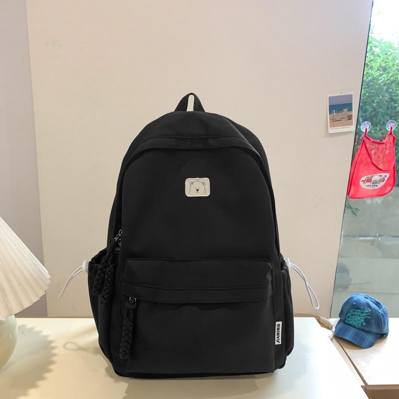 New Niche Primary School Students Boys and Girls Universal Large-capacity Lightweight Simple Korean Version Solid Color Large-capacity Schoolbag