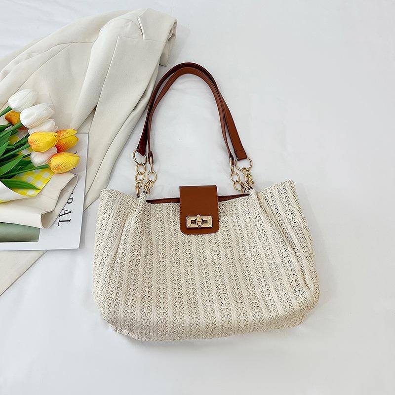 

Handwoven straw bag women s new seaside niche design messenger bag portable tote bag