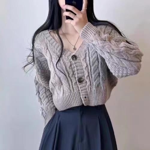 Short twist knitted sweater women's coat autumn new design sense knitted solid color long-sleeved cardigan women