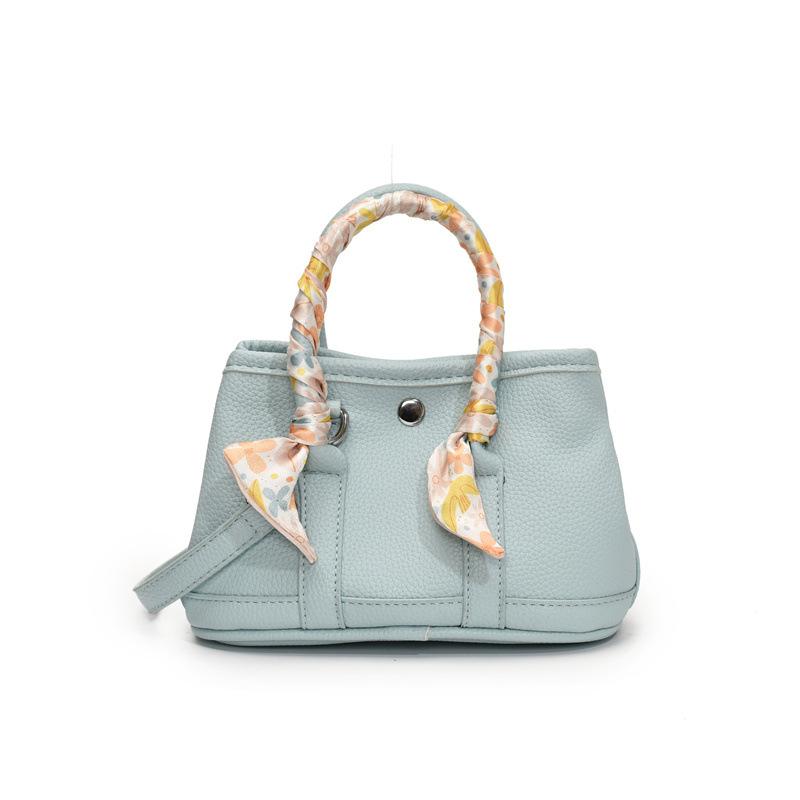 High-end trendy fashion hand-carried bucket bag women 2025 new simple casual shoulder bag small fresh messenger bag