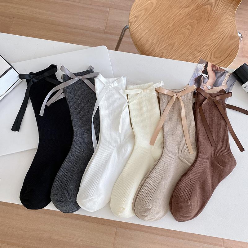 

Women s Spring and Autumn Bow Ribbon Vertical Stripes Double-needle White Lolita Mid-calf Cotton Socks 1 pair чорний