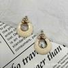 Retro Hong Kong-Style Cream White Geometric Drop Earrings - Elegant Round Hoop Studs for Women.