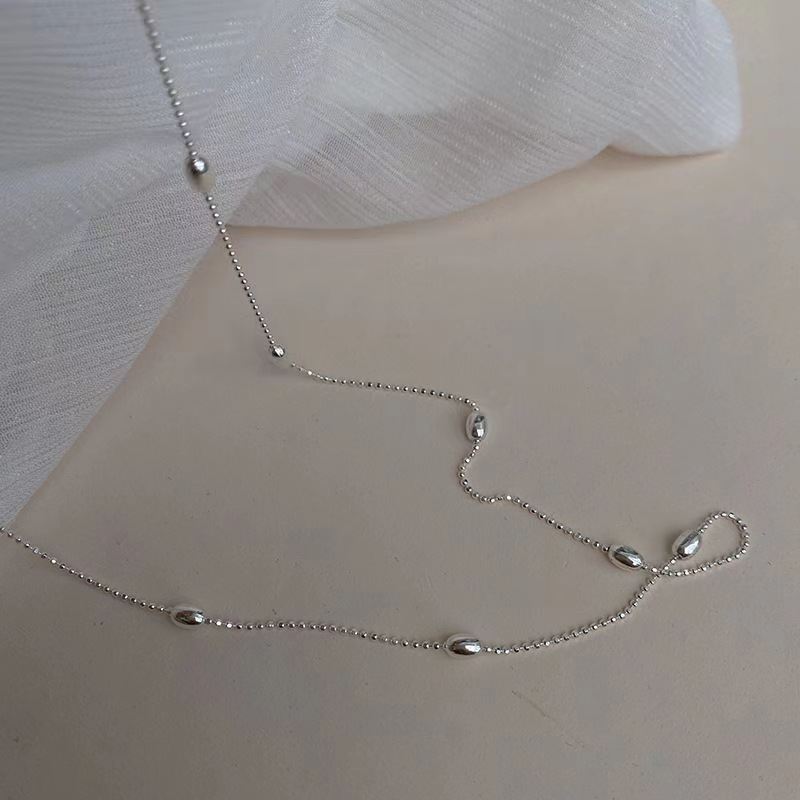 

Simple And Versatile Millet Bead Necklace, Female Niche Design, High-End Exquisite Collarbone Chain, Ultra-Fine Temperament Round Bead Chain