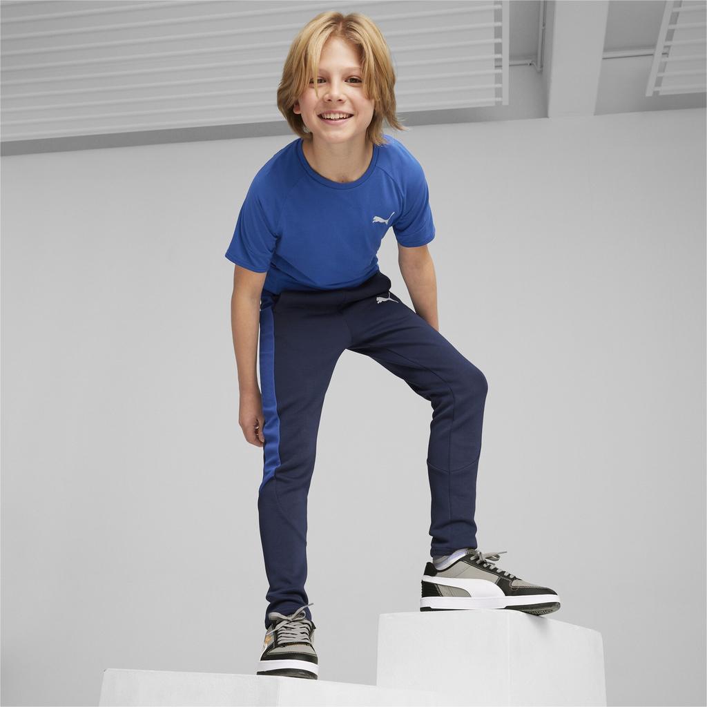 Puma EVOSTRIPE DK boys' sweatpants navy blue 67919814 size 164
