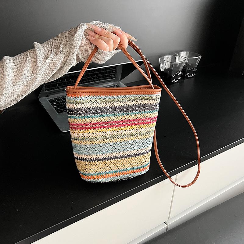 Colorful beach colorful straw small bag women's 2025 summer new shoulder armpit bag fashionable woven bucket bag