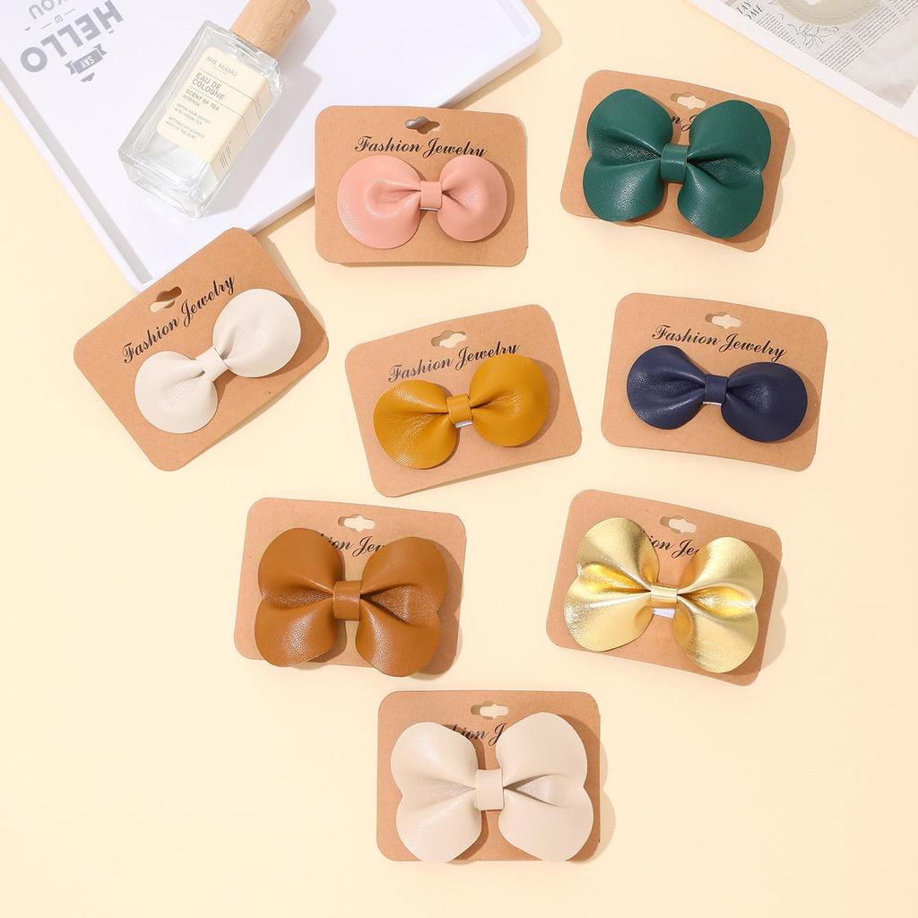 New Cute Leather Bow Duckbill Hair Clips - Simple, Fashionable Solid Color Hairpins for Bangs