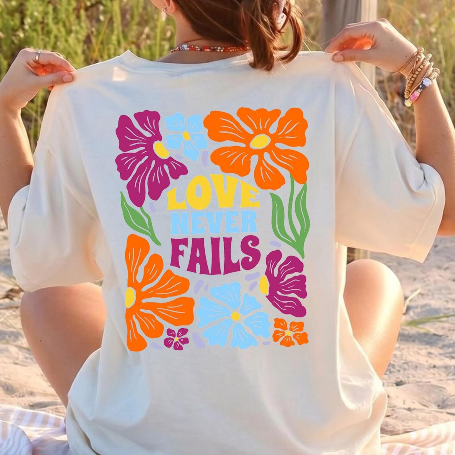 Comfort Colors Love Never Fails Shirt, Christian Floral Tee, Bible Verse Flower Shirt, Faith Based Graphic T Shirt, Religious Gift for Women 2XL