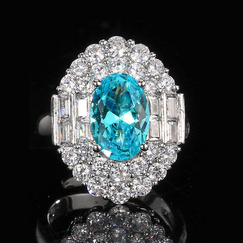 

Ювелирные изделия Медное основание Позолоченный Имитация Аквамарина Набор Ретро Креативный Ювелирный Набор Главный камень 8 * 12