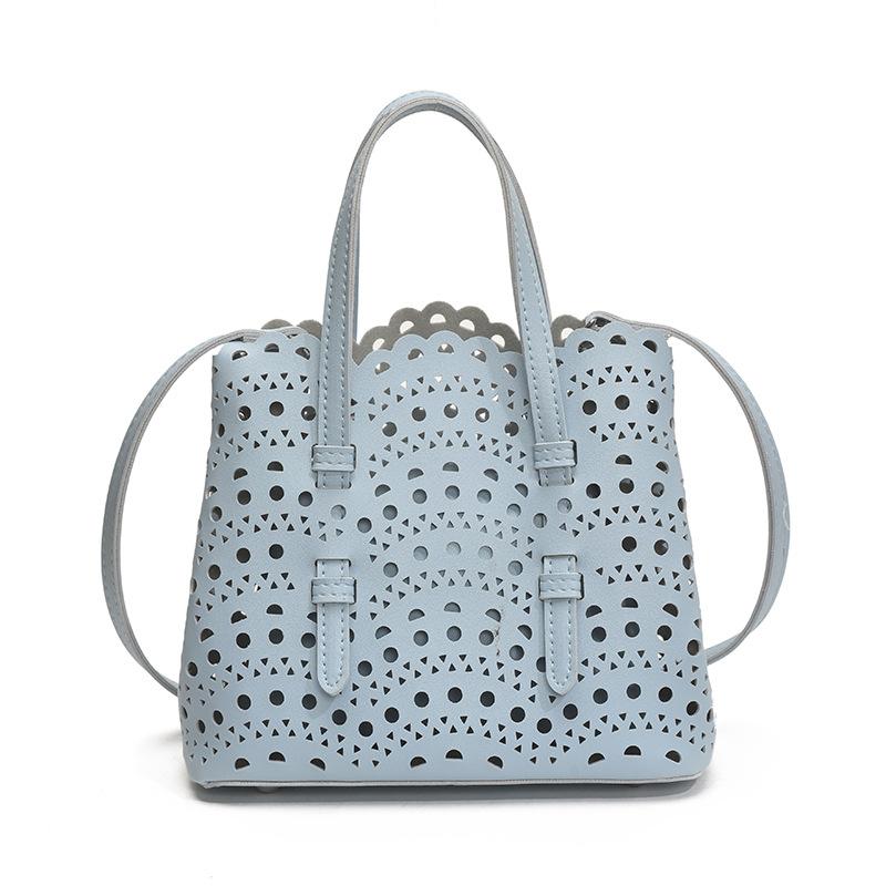 Niche design new engraved portable tote bag summer shoulder hollow vegetable basket bag women's bag messenger bag