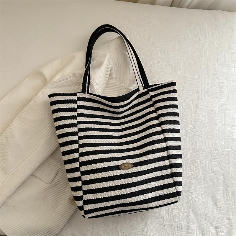 

Полосатая холщовая сумка 2025 новая сумка-тоут в стиле инс, сумка для отдыха на плечо, большая вместимость, сумка-тоут, сумка для покупок чёрный