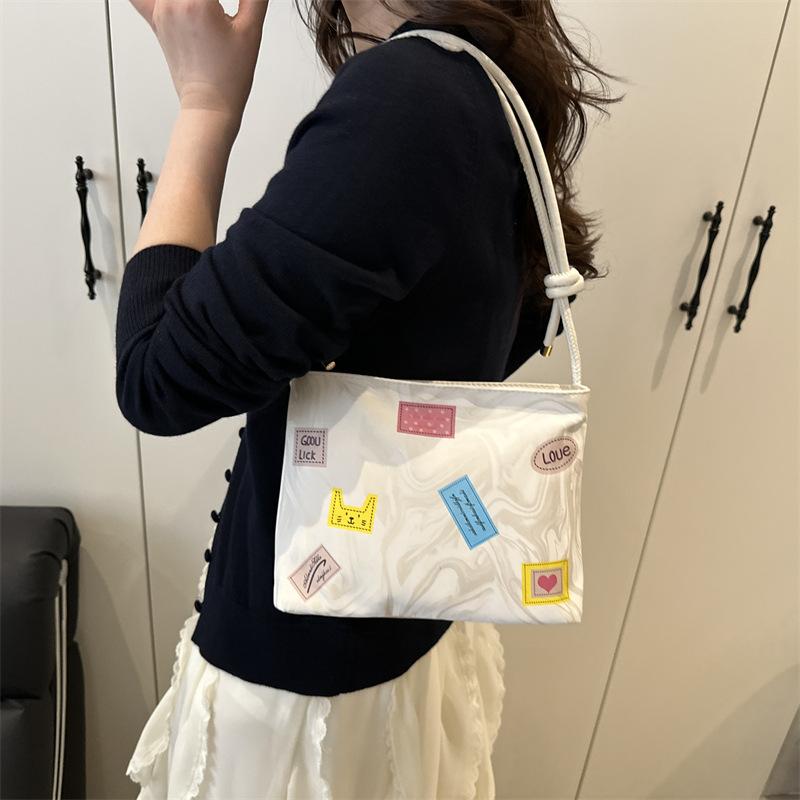 Casual texture 2025 summer new fashion trend design women's shoulder crossbody small square bag
