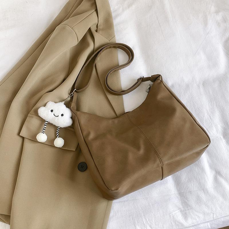 

Casual large-capacity tote bag women s 2024 spring and summer new casual simple shoulder bag commuting beautiful messenger bag Without pendant коричневий