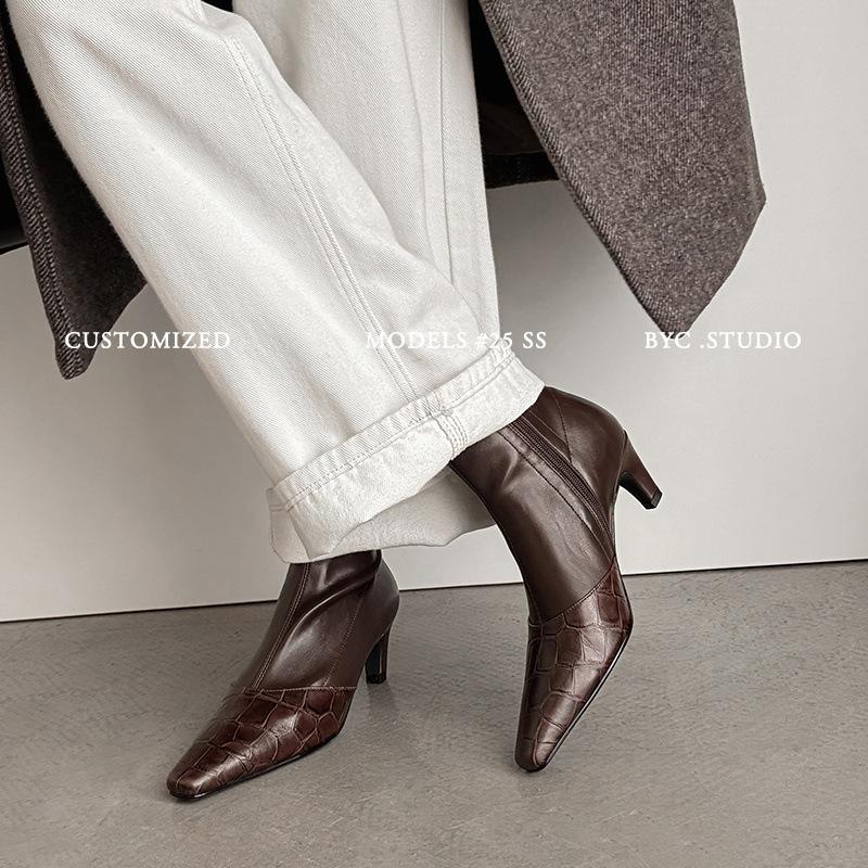 

Embossed cowhide thin boots women s elastic boots autumn and winter new leather thick heel middle heel side zipper elastic short boots women 39