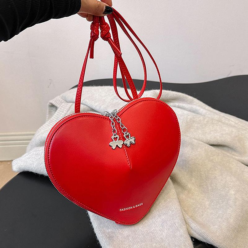 

2025 Сумка из натуральной кожи в форме персикового сердца Простая универсальная сумка через плечо Высококачественное 3D сердце любви A1