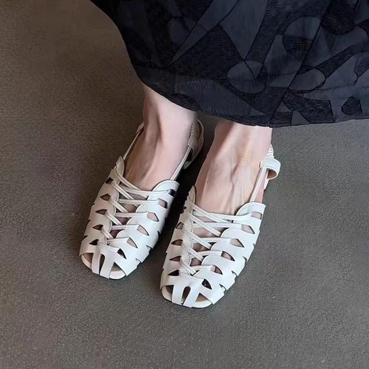 Sheepskin version~ French niche hollow breathable soft leather Roman sandals women's summer back strap flat-bottomed bag head pig cage shoes