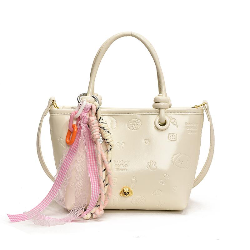 Trendy new cute embossed Korean version of high-end portable bucket bag casual versatile travel commuter messenger bag woman
