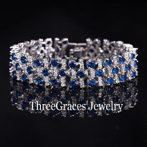 

ThreeGraces Jewelry Fashion White Gold Color Luxury White and Royal Blue CZ Crystal Stone Big Bracelets Bangles for Women BR038 18CM синий