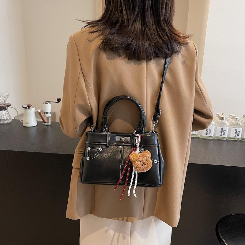 

Premium sense hand carry fashion Kelly bag women s 2025 autumn and winter retro versatile shoulder bag niche simple casual women s bag 27*10*16 чорний