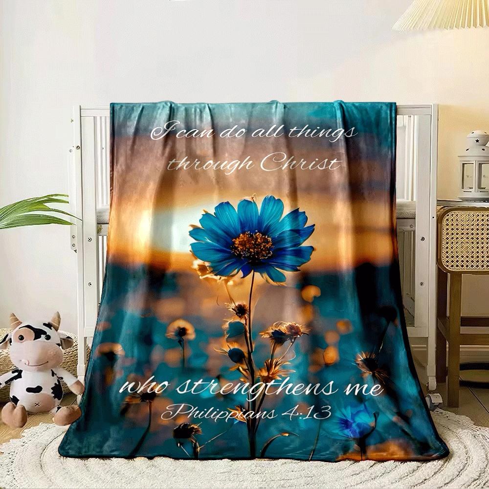 A vibrant blue flower glowing in sunset lighting with a biblical quote. for all seasons blanket lunch break throw gift 80cm x 120cm