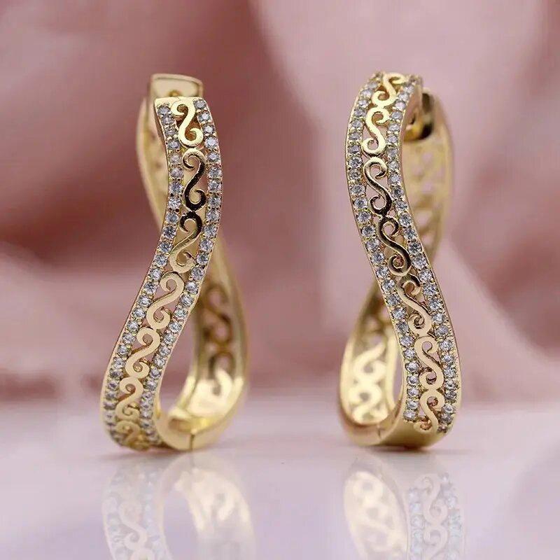 

European and American Trend Design Niche Ear Button Women s Palace Style S-shaped Micro Inlaid Hollow Irregular Accessories