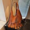 Large-capacity commuter fringed bag women's 2026 spring new retro go out hand carry shoulder armpit bag