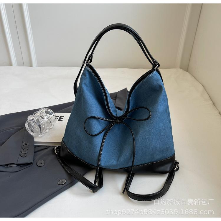 

Korean large-capacity canvas bag women s 2025 new trendy college style tote backpack casual shoulder bucket bag синій