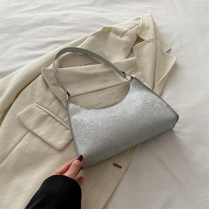 

Stylish Contemporary Small Handbag With Unique Design And Soft Structure For Fashion Lovers срібний