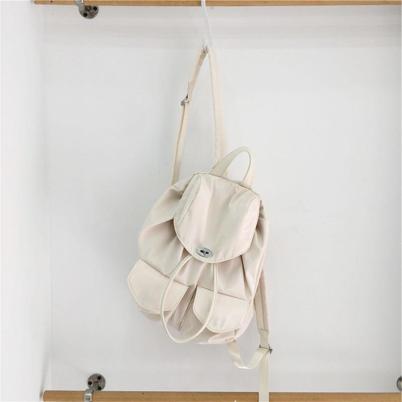 Nouveau sac à dos en nylon imperméable anti-rides pour femme, été décontracté, multi-poches, couleur unie, sac à dos de ville