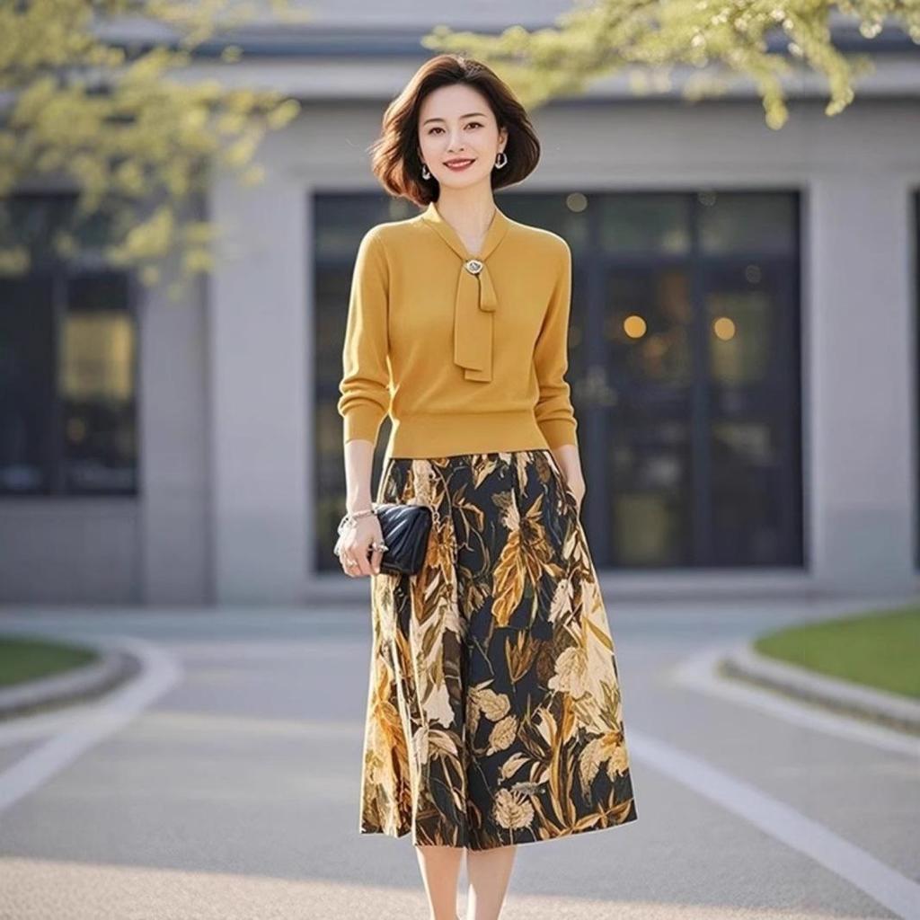 Yellow Knitted Two-Piece Set: Tie-Up Top & Printed Midi Skirt for Spring 2025 Women
