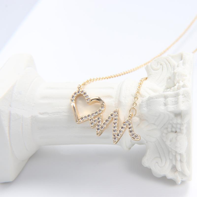 Heartbeat love necklace female niche design pendant light luxury high sense pendant collarbone chain versatile jewelry wholesale