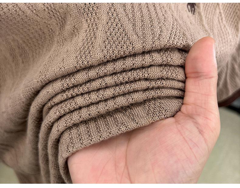 Męski letni dzianinowy sweter z krótkim rękawem w koreańskim stylu z haftem żakardowym 2025