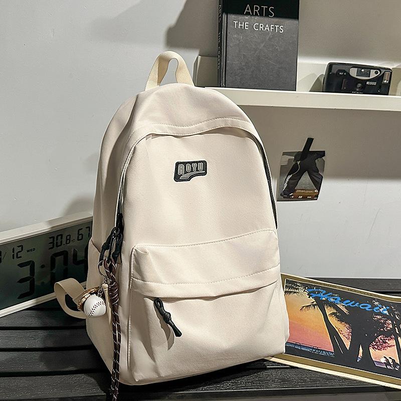 Student schoolbag Junior high school student backpack Elementary school student school large capacity high value solid color schoolbag new