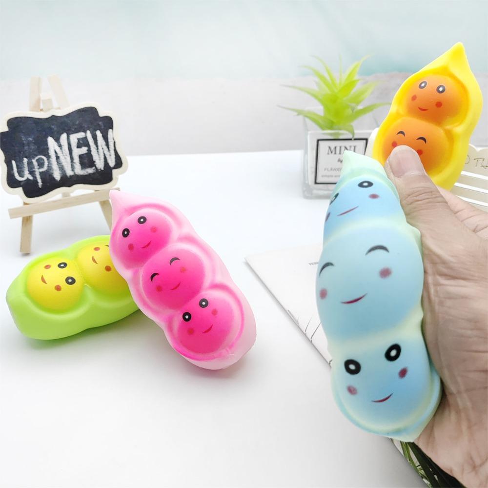 Neue Erbsenschote Squishy Kreative Smiley Erbse Puppe Handknetspielzeug zur Stressbewältigung und täglichen Unterhaltung