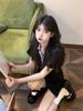 Contrasting color small black dress French polo collar dress women's summer new a-word split skirt small short skirt ins