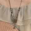 Retro pendant, ethnic style ceramic butterfly bell necklace, women's new trendy long sweater chain with accessories