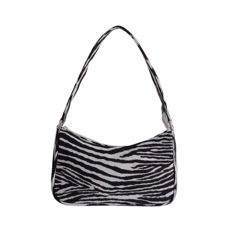 zebra print shoulder bolsa