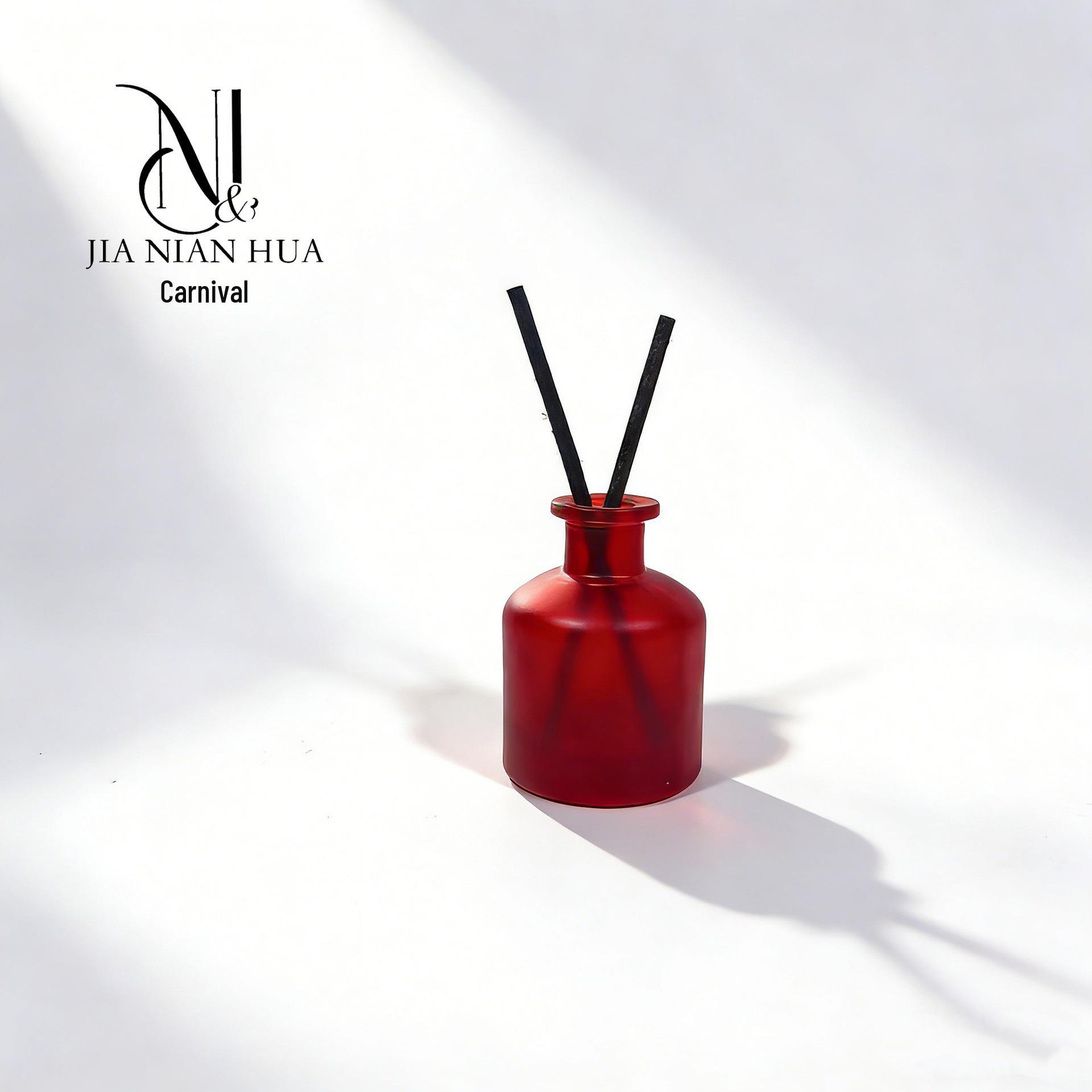 In-stock large red spray-painted flameless glass aromatherapy bottle for home decor.